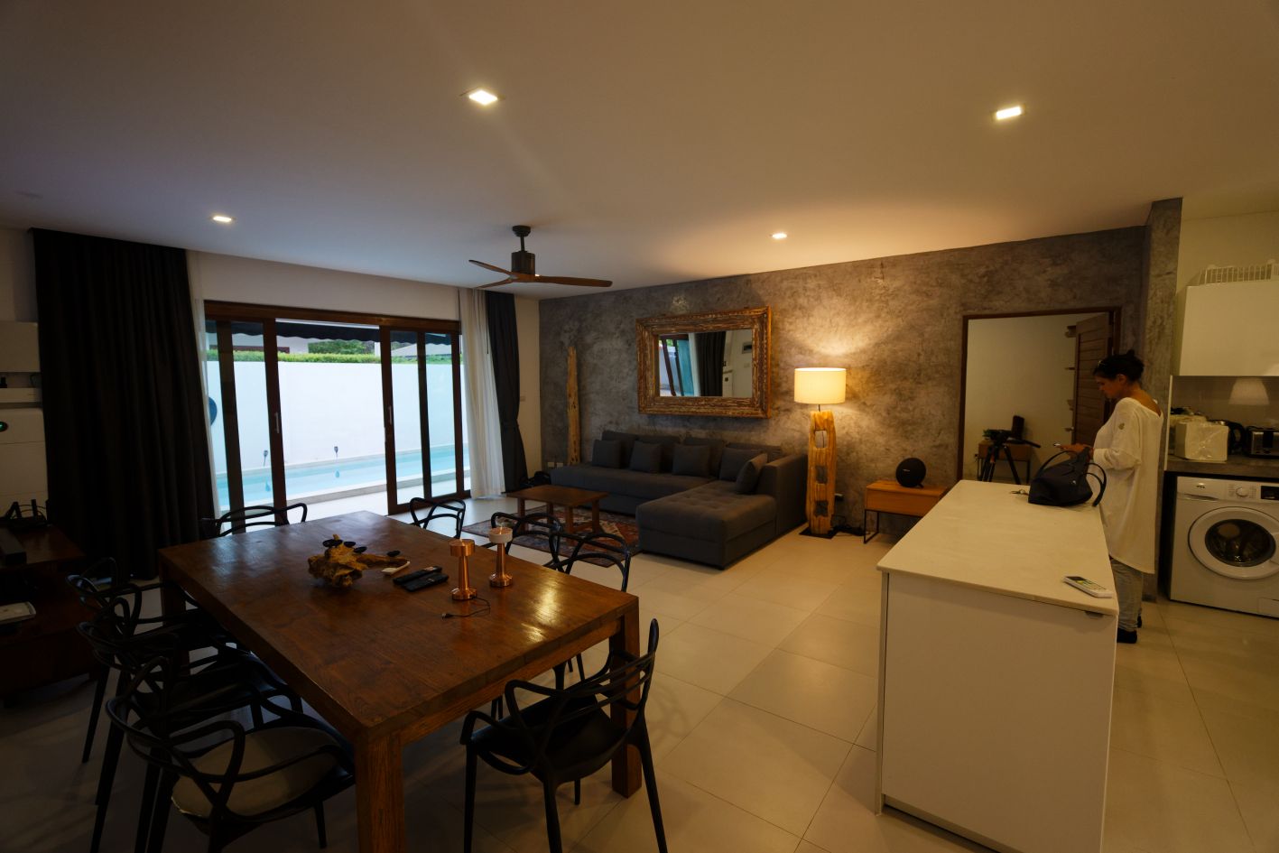 Luxurious 2-bedroom villa with pool in Koh Phangan for sale at 10,5M THB. Features eco-friendly design, solar panels, and serene island living.