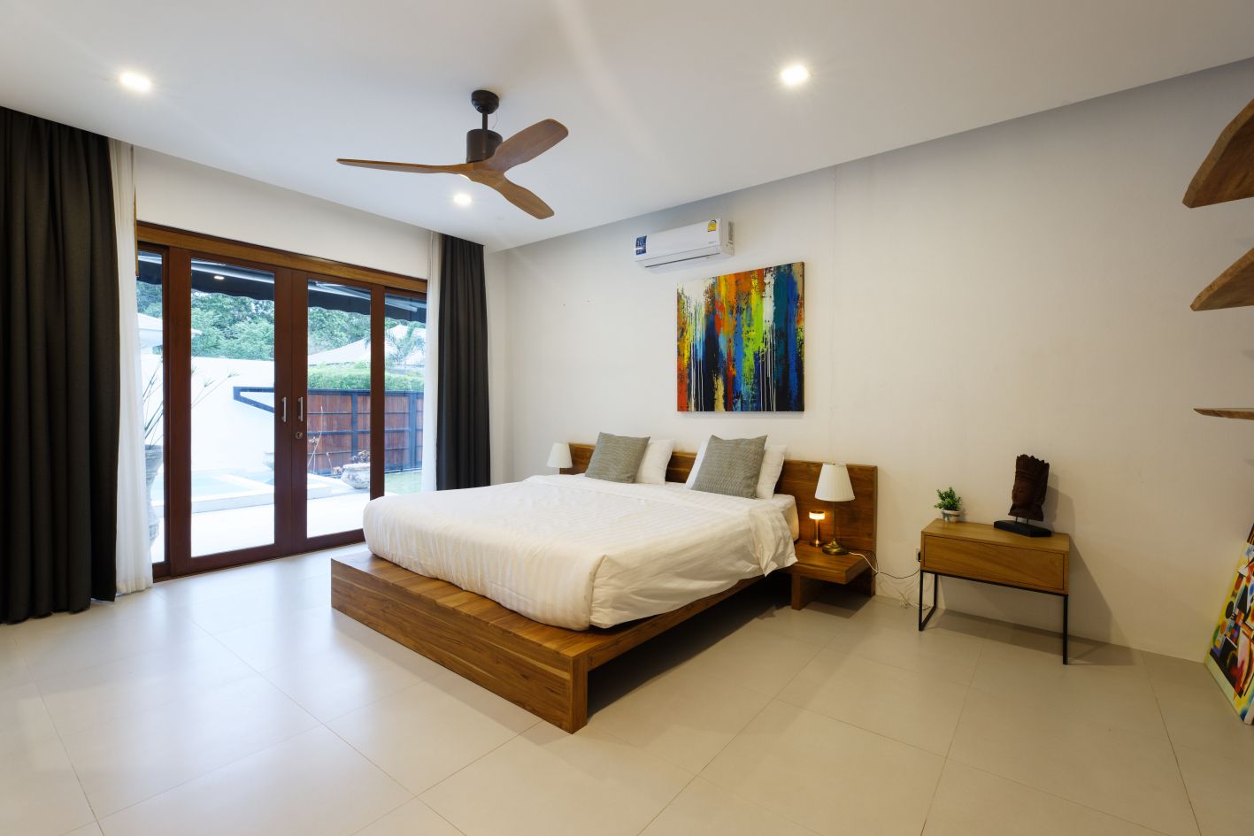 Luxurious 2-bedroom villa with pool in Koh Phangan for sale at 10,5M THB. Features eco-friendly design, solar panels, and serene island living.