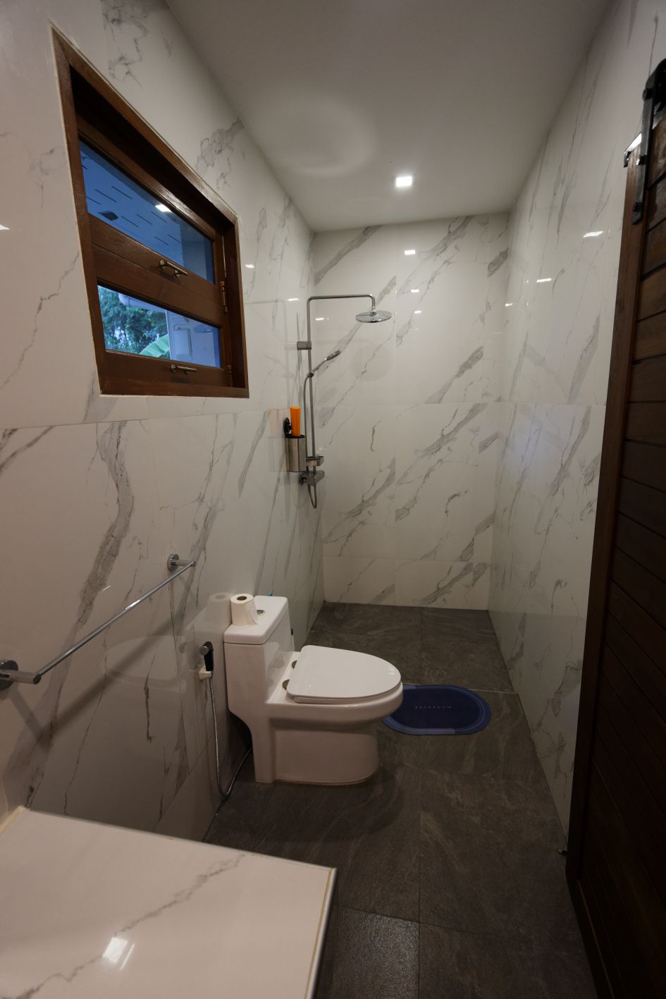 Luxurious 2-bedroom villa with pool in Koh Phangan for sale at 10,5M THB. Features eco-friendly design, solar panels, and serene island living.