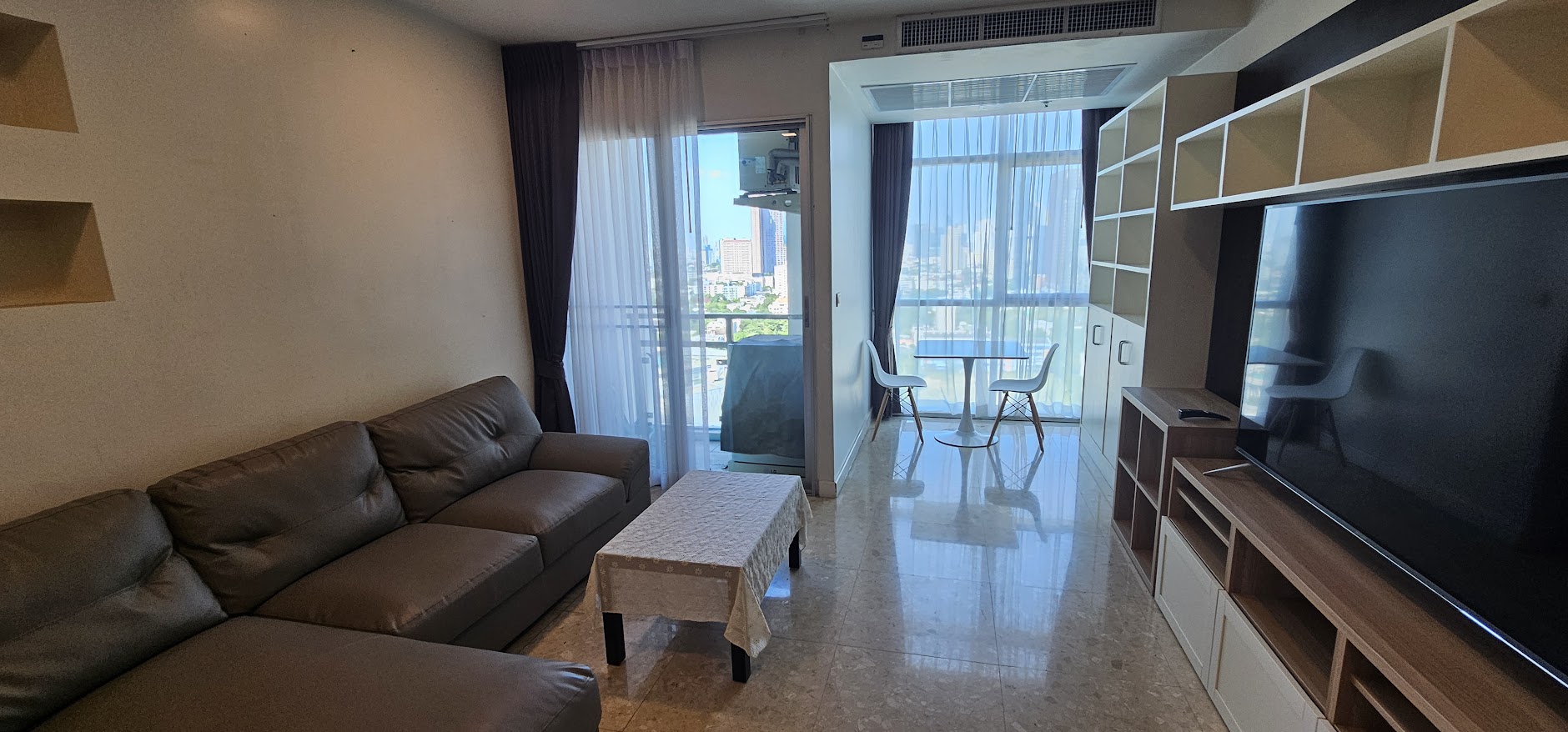 1-bedroom, 2-bath condo at Nusasiri Grand, 80 sqm, steps from BTS Ekkamai. Rent for 35,000 THB/month. Prime location, luxury living.