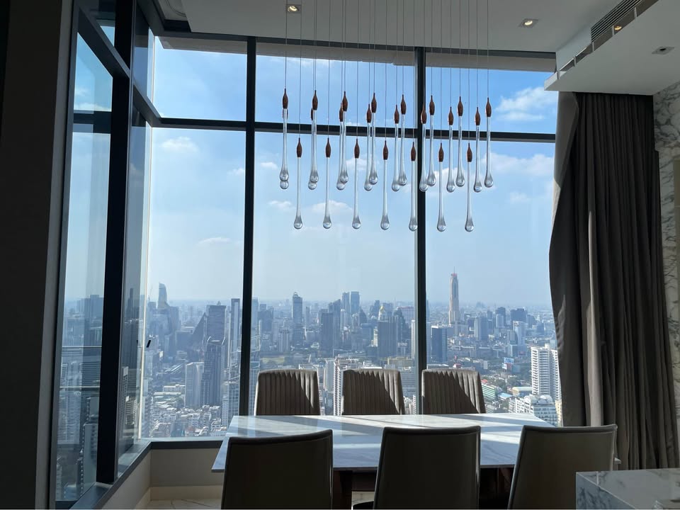 Own a luxurious 157 sqm penthouse at The Esse Asoke, Bangkok. Featuring 2 bedrooms, 3 bathrooms, breathtaking views, and premium amenities. Sale price: 60M THB.