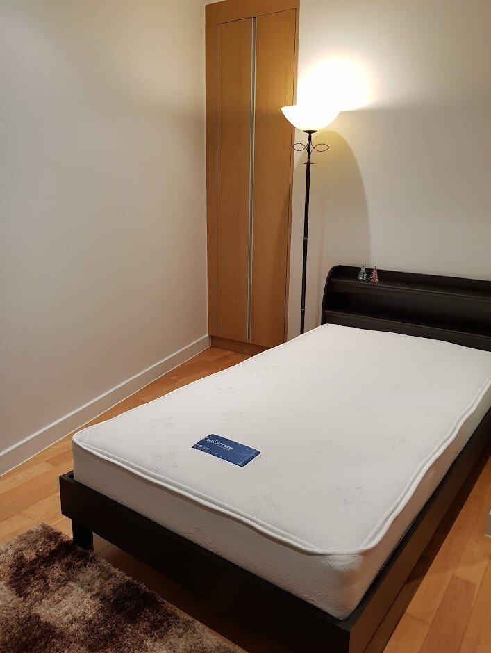 Fully furnished 2-bedroom, 2-bathroom condo at Millennium Residence, 92 sqm, 37th floor with unblocked city views, modern Western kitchen, and luxury amenities.