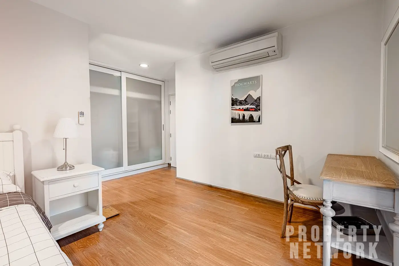 Spacious 2-bedroom, 2-bathroom condo at D 65 Condominium, 67.8 sqm, fully furnished with a balcony, modern kitchen, and amenities near BTS Ekkamai.