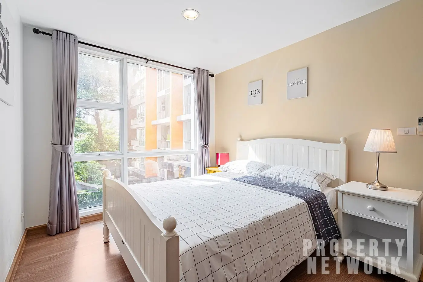 Spacious 2-bedroom, 2-bathroom condo at D 65 Condominium, 67.8 sqm, fully furnished with a balcony, modern kitchen, and amenities near BTS Ekkamai.
