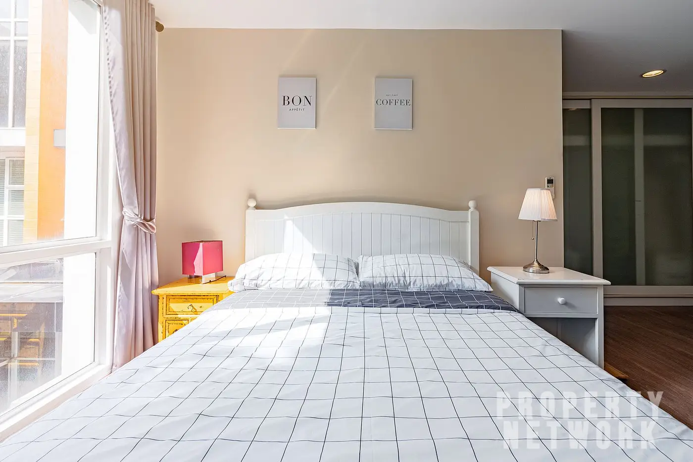 Spacious 2-bedroom, 2-bathroom condo at D 65 Condominium, 67.8 sqm, fully furnished with a balcony, modern kitchen, and amenities near BTS Ekkamai.