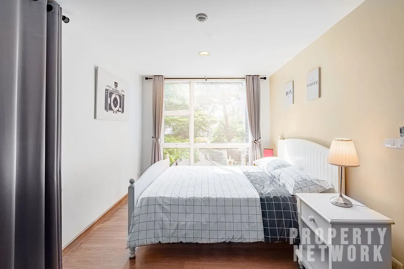 Spacious 2-bedroom, 2-bathroom condo at D 65 Condominium, 67.8 sqm, fully furnished with a balcony, modern kitchen, and amenities near BTS Ekkamai.
