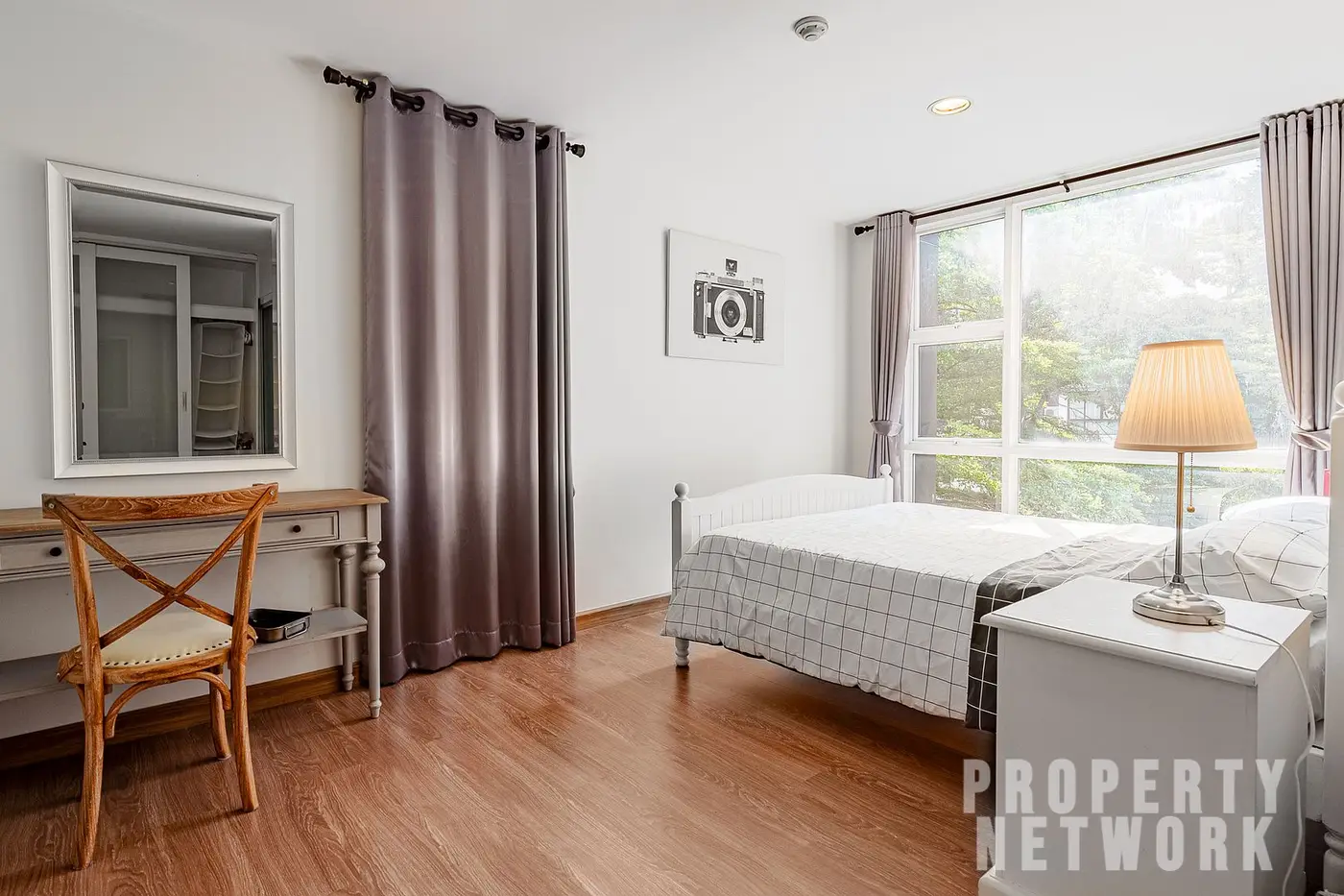 Spacious 2-bedroom, 2-bathroom condo at D 65 Condominium, 67.8 sqm, fully furnished with a balcony, modern kitchen, and amenities near BTS Ekkamai.