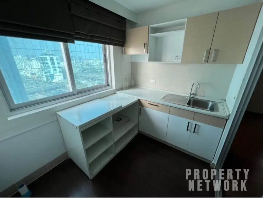 Fully furnished 2-bedroom, 1-bathroom condo at Supalai Park Ekamai Thonglor, 83 sqm, 19th floor, with city views, swimming pool, gym, and rooftop terrace.