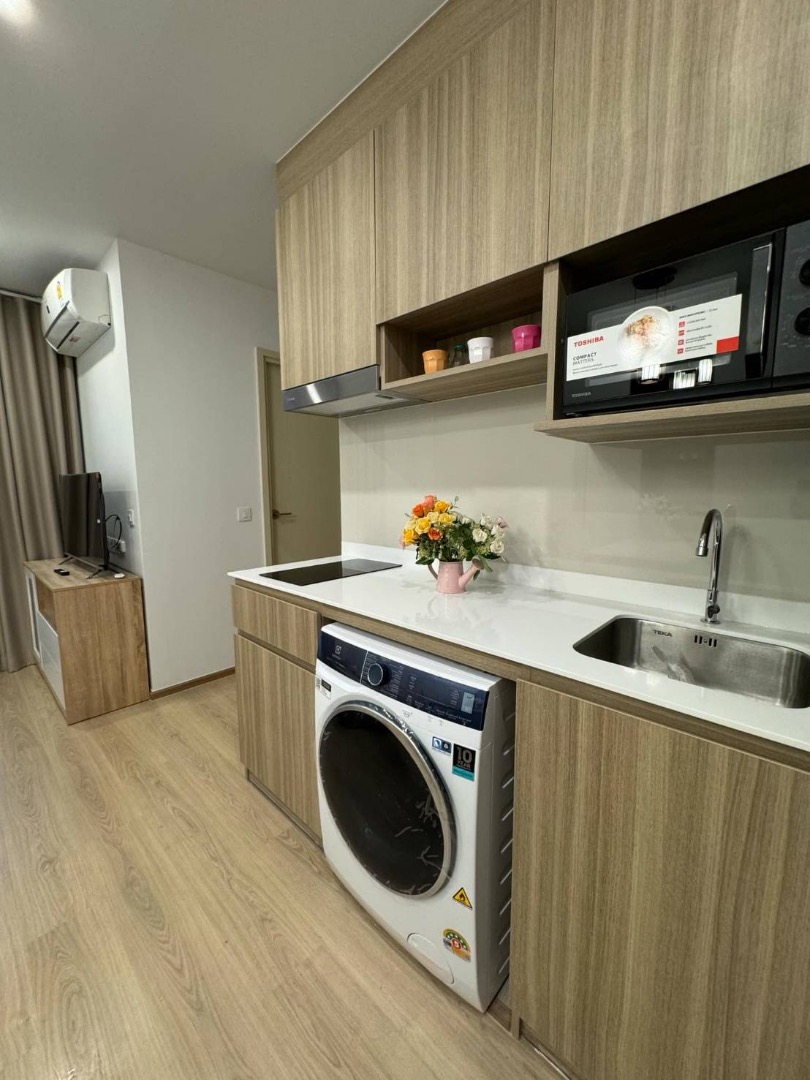 Luxury 2-bedroom, 1-bathroom condo at Life Rama 4-Asoke, 48 sqm, fully furnished with modern decor, high-end appliances, and excellent facilities near MRT Queen Sirikit.