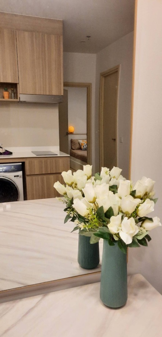 Luxury 2-bedroom, 1-bathroom condo at Life Rama 4-Asoke, 48 sqm, fully furnished with modern decor, high-end appliances, and excellent facilities near MRT Queen Sirikit.