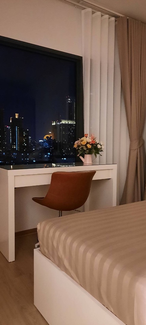 Luxury 2-bedroom, 1-bathroom condo at Life Rama 4-Asoke, 48 sqm, fully furnished with modern decor, high-end appliances, and excellent facilities near MRT Queen Sirikit.