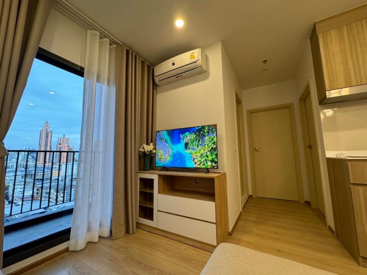 Luxury 2-bedroom, 1-bathroom condo at Life Rama 4-Asoke, 48 sqm, fully furnished with modern decor, high-end appliances, and excellent facilities near MRT Queen Sirikit.