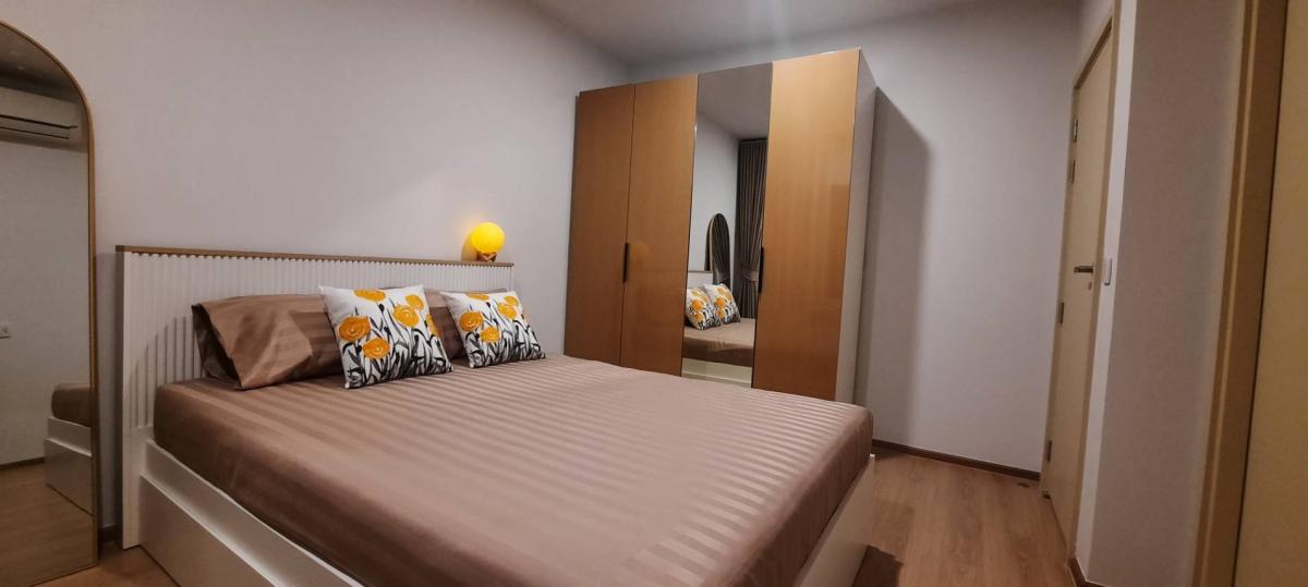 Luxury 2-bedroom, 1-bathroom condo at Life Rama 4-Asoke, 48 sqm, fully furnished with modern decor, high-end appliances, and excellent facilities near MRT Queen Sirikit.