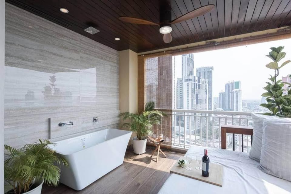 Spacious 4-bedroom penthouse at Wilshire Condominium, featuring modern interiors, skyline views, private balcony, and high-end amenities in Sukhumvit 22, Bangkok.