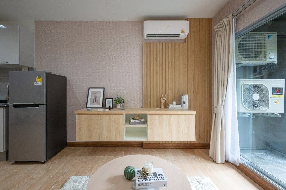 Modern 2-bedroom condo at The Seed Muse 26 with private garden, stylish interiors, and direct pool access in Sukhumvit 26, Bangkok.