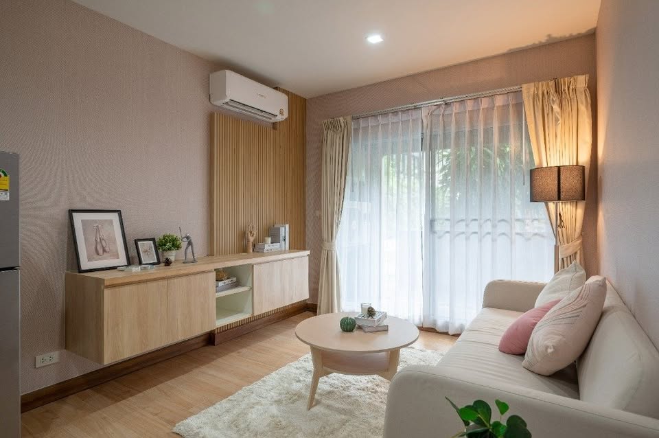 Modern 2-bedroom condo at The Seed Muse 26 with private garden, stylish interiors, and direct pool access in Sukhumvit 26, Bangkok.