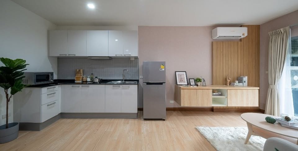 Modern 2-bedroom condo at The Seed Muse 26 with private garden, stylish interiors, and direct pool access in Sukhumvit 26, Bangkok.