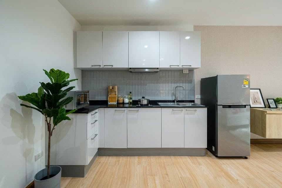 Modern 2-bedroom condo at The Seed Muse 26 with private garden, stylish interiors, and direct pool access in Sukhumvit 26, Bangkok.