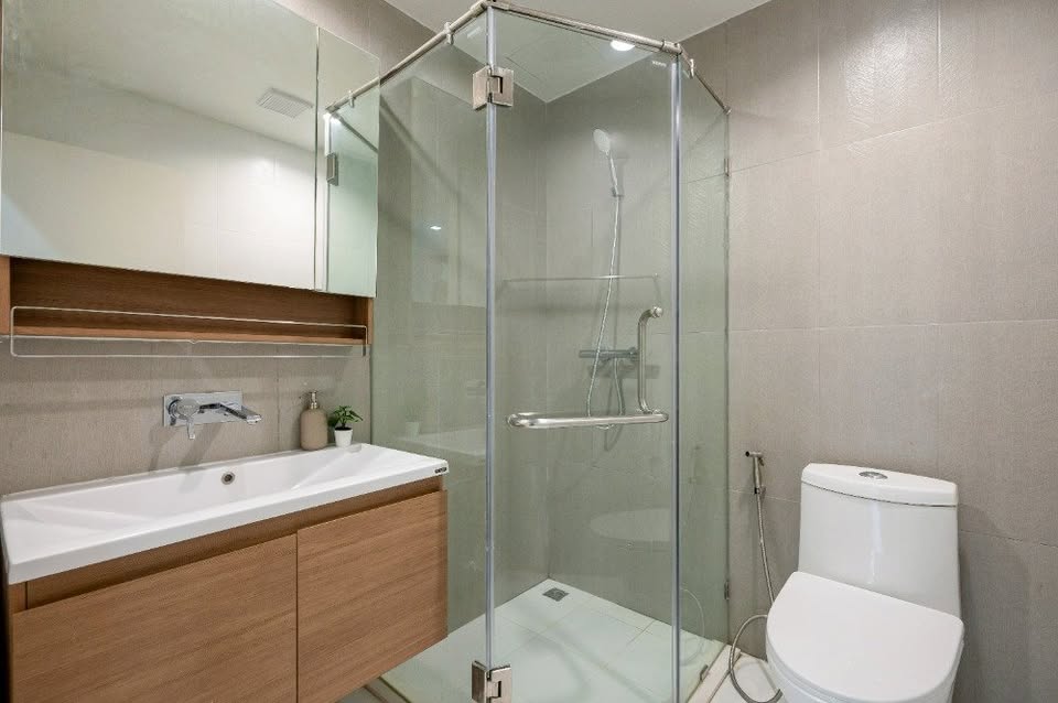 Modern 2-bedroom condo at The Seed Muse 26 with private garden, stylish interiors, and direct pool access in Sukhumvit 26, Bangkok.