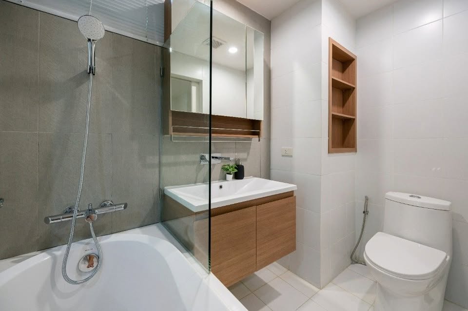 Modern 2-bedroom condo at The Seed Muse 26 with private garden, stylish interiors, and direct pool access in Sukhumvit 26, Bangkok.