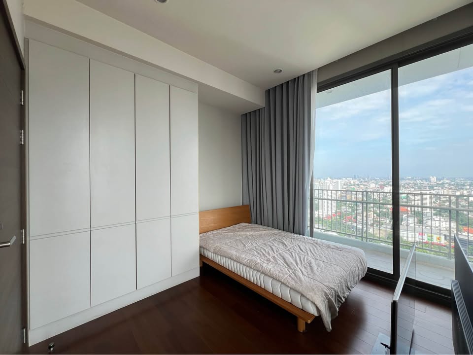 Elegant 3-bedroom condo in Quattro By Sansiri, Bangkok, featuring modern interiors and panoramic city views.