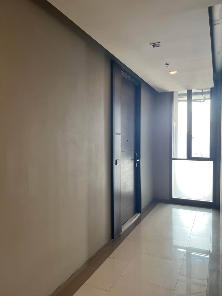 Elegant 3-bedroom condo in Quattro By Sansiri, Bangkok, featuring modern interiors and panoramic city views.