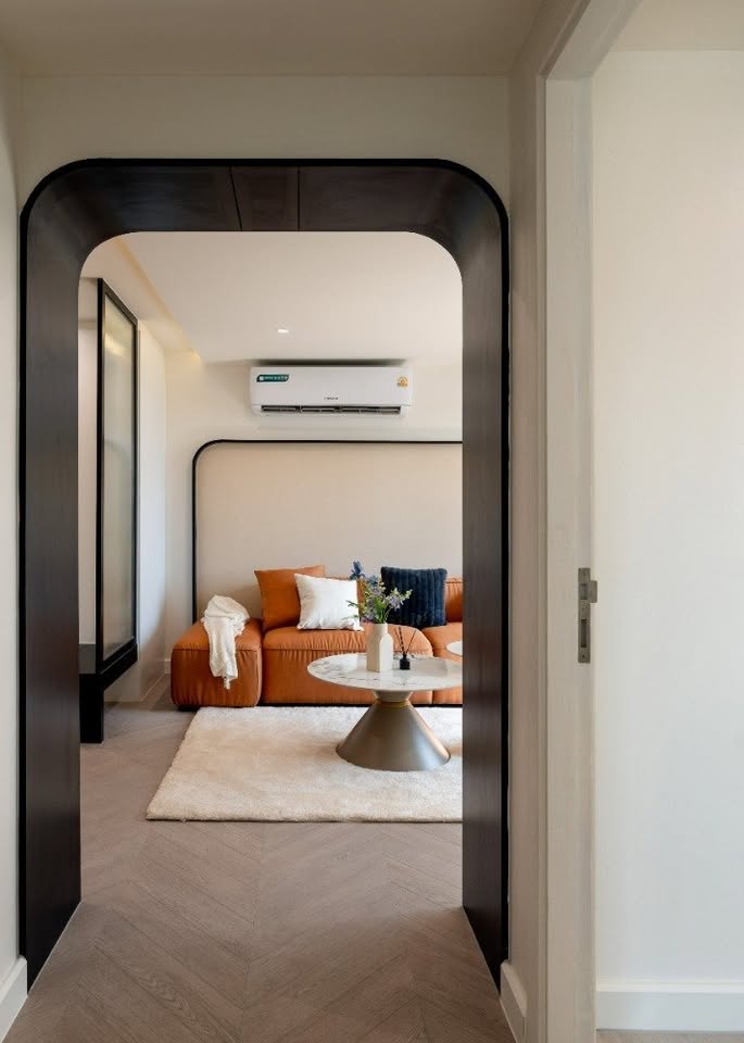 Top-floor corner unit at Le Nice Ekamai featuring a spacious 3-bedroom layout, modern western kitchen with island, and panoramic city views.