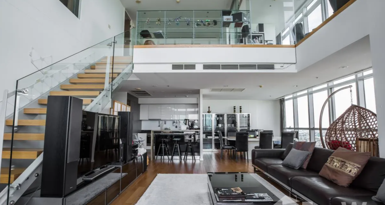 Luxurious 4-bed, 3-bath, 258 sqm duplex at The River Bangkok. High-floor unit with stunning river views. For sale at ฿74.5M. Contact us for a viewing!