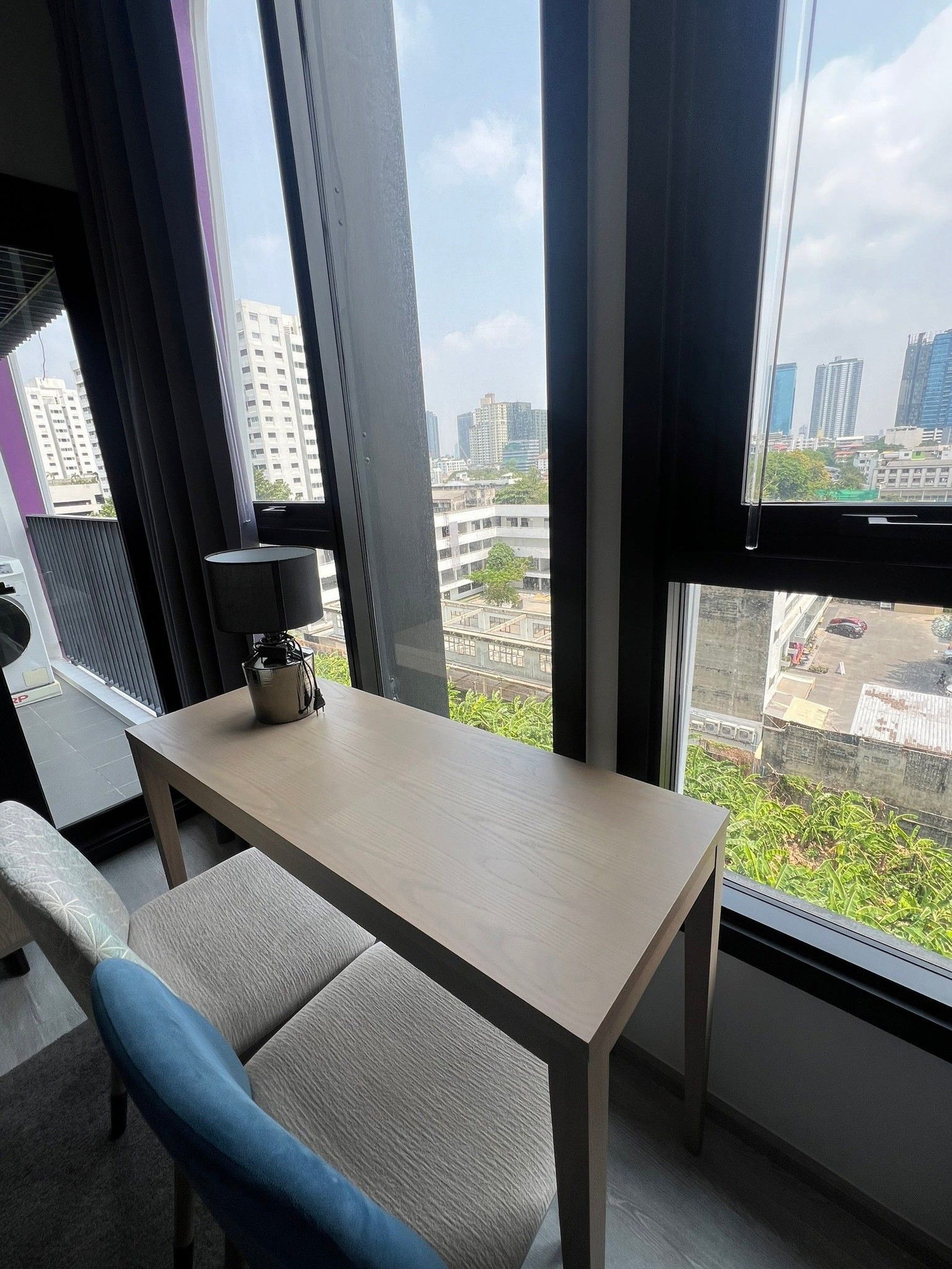 Modern 1-bedroom condo at XT Ekkamai, fully furnished with smart home features, city views, and premium amenities, including a rooftop pool and co-working spaces.
