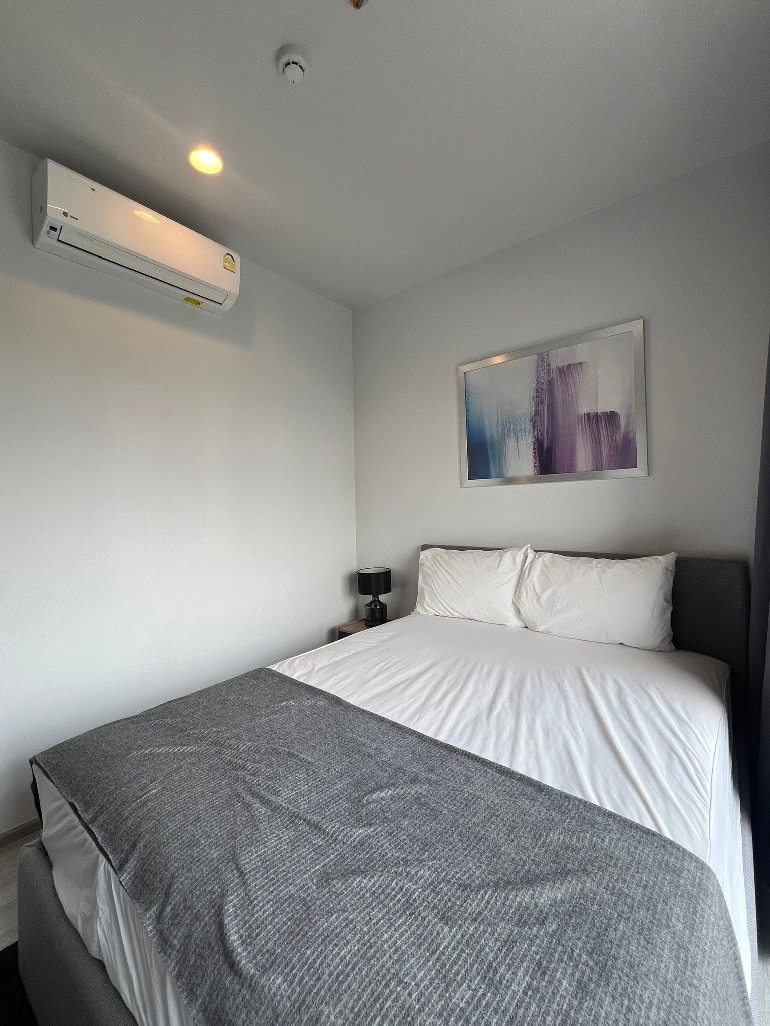 Modern 1-bedroom condo at XT Ekkamai, fully furnished with smart home features, city views, and premium amenities, including a rooftop pool and co-working spaces.