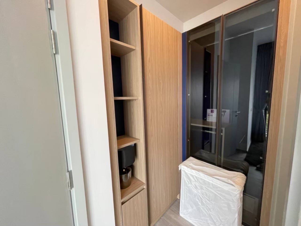 Modern 1-bedroom condo at XT Ekkamai, fully furnished with smart home features, city views, and premium amenities, including a rooftop pool and co-working spaces.