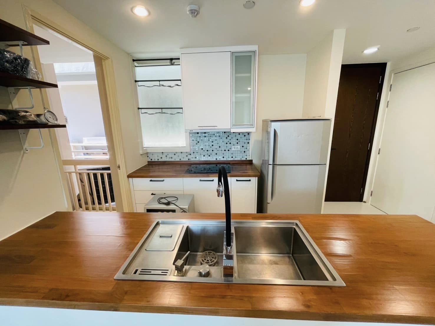 Elegant 2-bedroom condo at Manhattan Chidlom, featuring stylish furnishings, high-floor city views, and premium amenities, located near BTS Chidlom in central Bangkok.