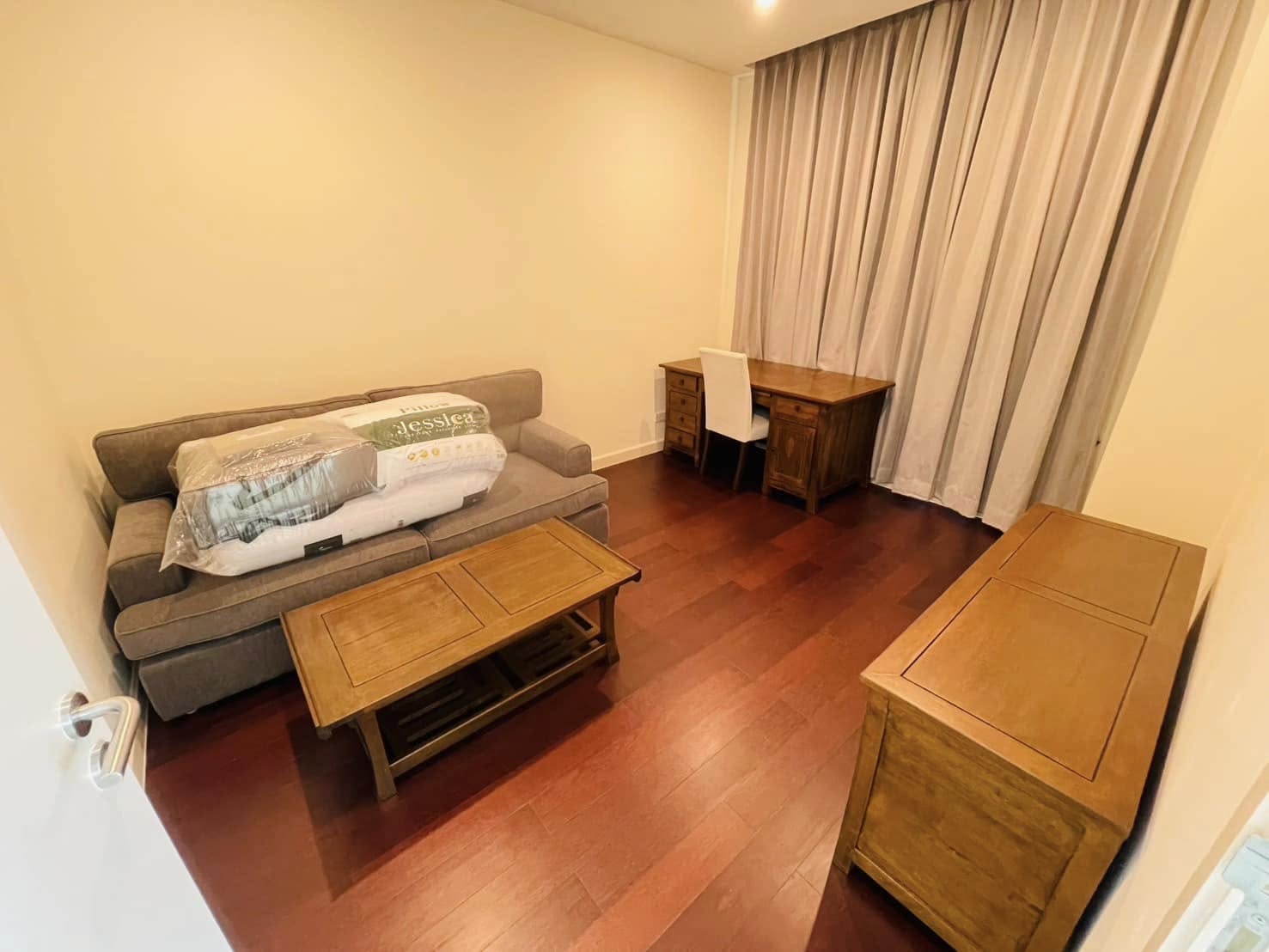 Elegant 2-bedroom condo at Manhattan Chidlom, featuring stylish furnishings, high-floor city views, and premium amenities, located near BTS Chidlom in central Bangkok.