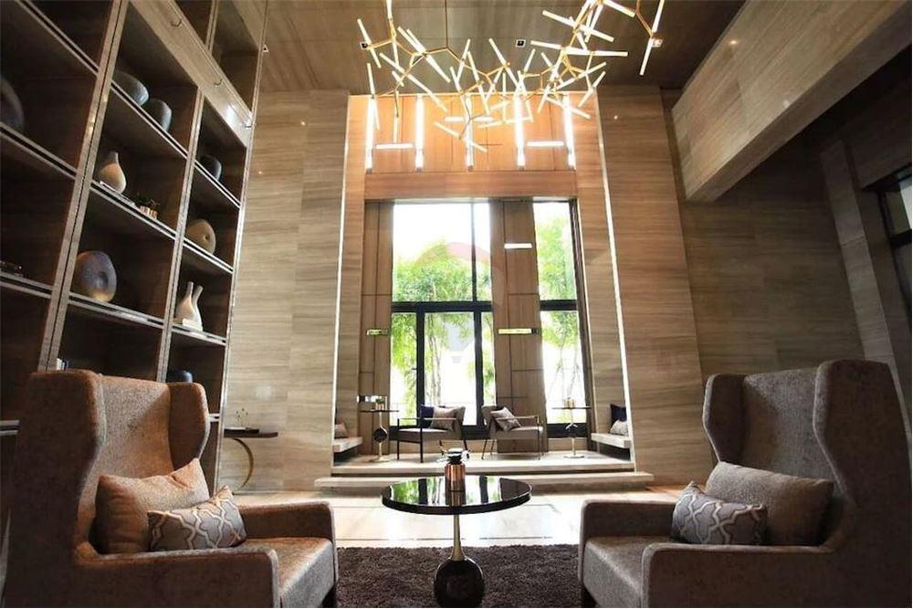 Elegant 1-bedroom condo at Circle Living Prototype with modern furnishings, high-floor city views, and eco-friendly smart home features in Bangkok.