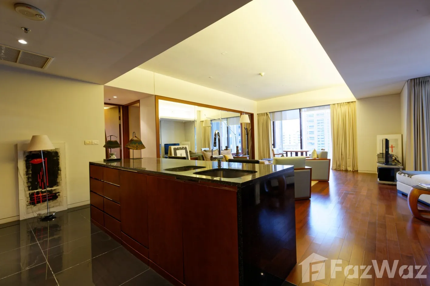Luxurious 2-bed, 2-bath condo at Hansar Rajdamri, 112 sqm. For sale at ฿10,000,000 or for rent at ฿75,000/month. Prime location, top amenities.