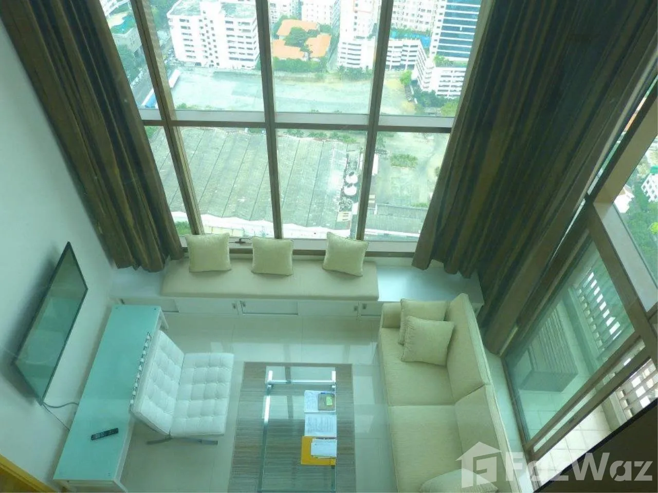 Stunning 2-bed, 2-bath duplex condo in Emporio Place, 134 sqm. For sale at ฿25M. Luxury living in Sukhumvit with excellent amenities and top-floor views.