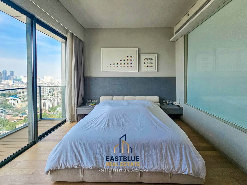 Luxury 2-bed 2-bath 111 sqm condo at TELA Thonglor for sale at 44.5M THB. High-floor unit with west-facing, unblocked view in prime Thonglor location.