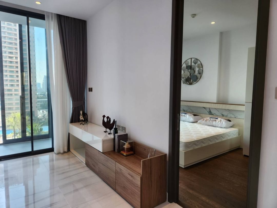 Luxurious 2-bed, 2-bath condo at Supalai Icon Sathorn, 93 sqm, pool view, fully furnished. Prime Sathorn location. Rent 100K THB. Contact us today!