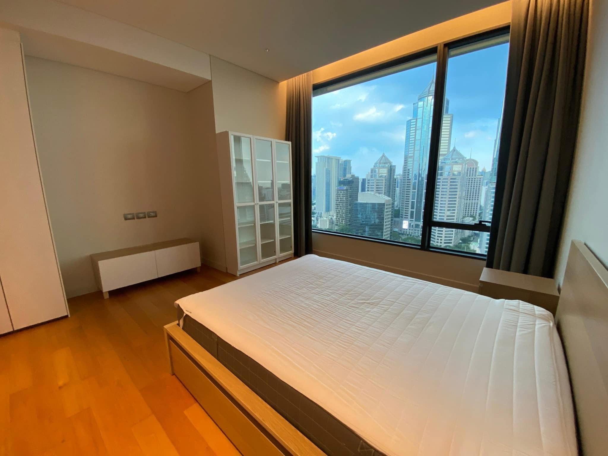 2-Bedrooms 2-Bathrooms 114 sqm condo at Sindhorn Residence for Rent 125,000 THB/Month or For Sale 28.9M THB. Prime Langsuan location, 3m ceilings, garden views.