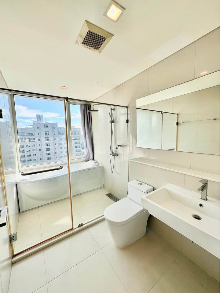 Stylish living room of 2-bedroom condo for rent at IVY Thonglor Bangkok with city view and modern furniture