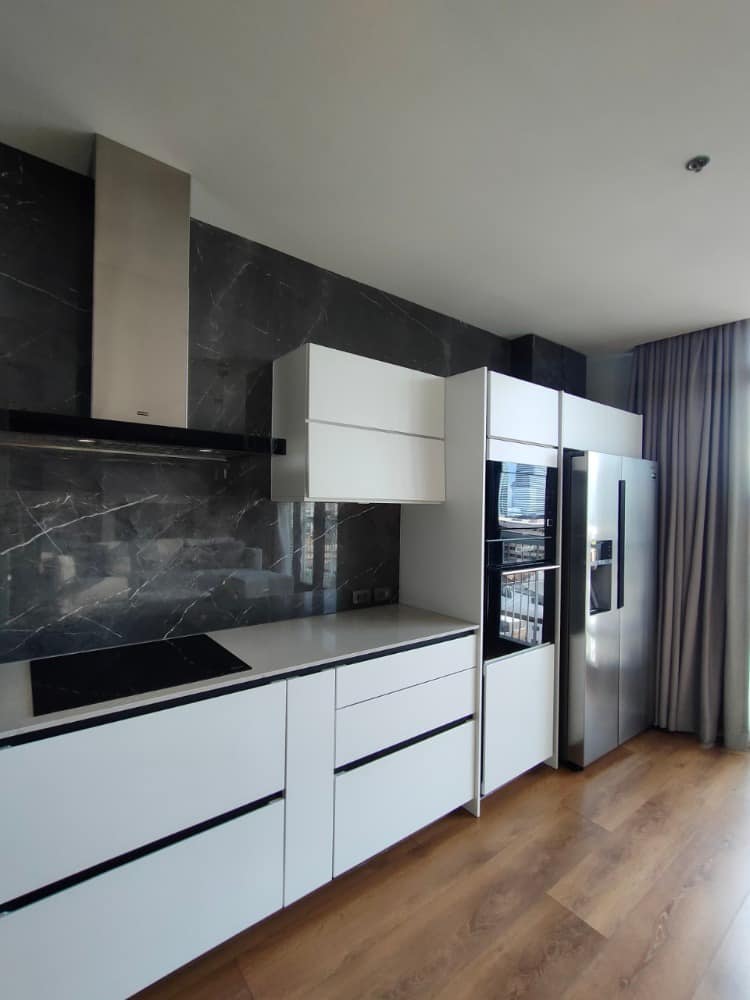 Luxury 2-bed, 2-bath condo at Park Origin Phrom Phong for rent. Fully renovated, 95 sqm, high floor, stunning views, premium amenities. Rent: 99,000 THB/month.