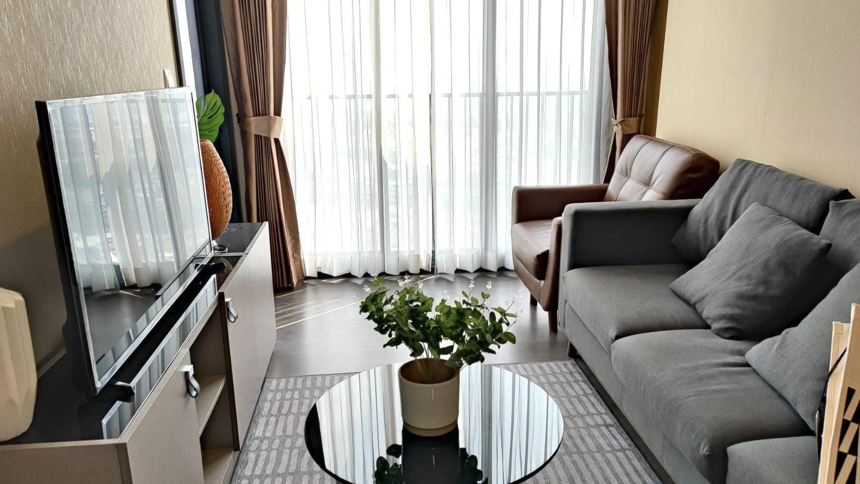 Stylish 1-bed 1-bath condo at Oka Haus Sukhumvit 36, 34.27 sqm, 30th floor river view. For sale at 5.2M. Modern amenities and prime location.