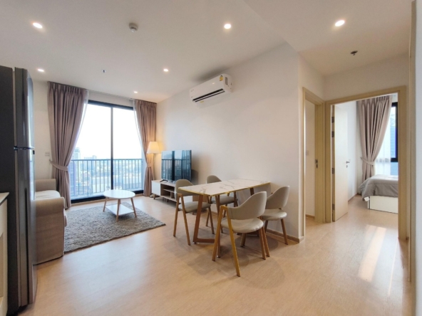 Fully furnished 2-bedroom 2-Bathroom condo for rent at Maru Ekkamai, 26th floor. Luxury amenities, pet-friendly, near BTS Ekkamai. Prime location at THB 62,000/month.
