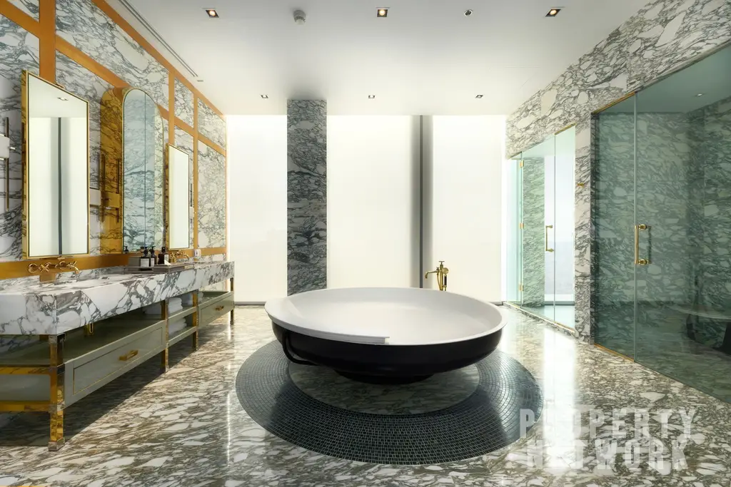 Discover luxury living at The Ritz-Carlton Residences, a 4-bedroom, 4-bathroom condo on the 58th floor, offering 486 sqm of elegance for sale at 350M THB. near BTS Chong Nonsi and near MRT Sam Yan