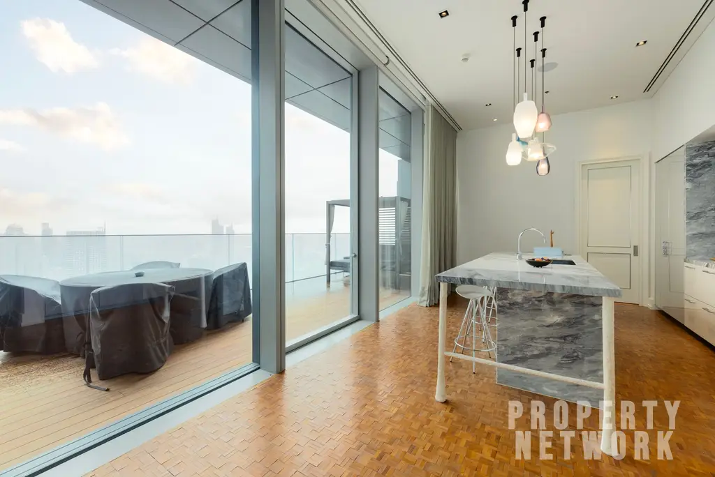 Discover luxury living at The Ritz-Carlton Residences, a 4-bedroom, 4-bathroom condo on the 58th floor, offering 486 sqm of elegance for sale at 350M THB. near BTS Chong Nonsi and near MRT Sam Yan
