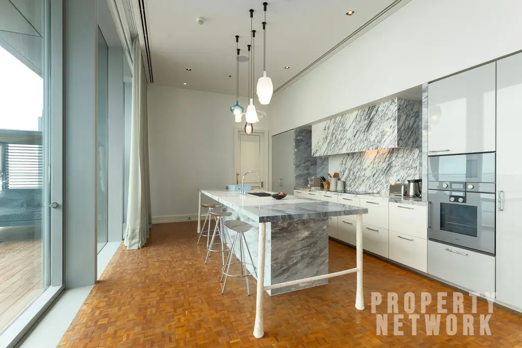 Discover luxury living at The Ritz-Carlton Residences, a 4-bedroom, 4-bathroom condo on the 58th floor, offering 486 sqm of elegance for sale at 350M THB. near BTS Chong Nonsi and near MRT Sam Yan