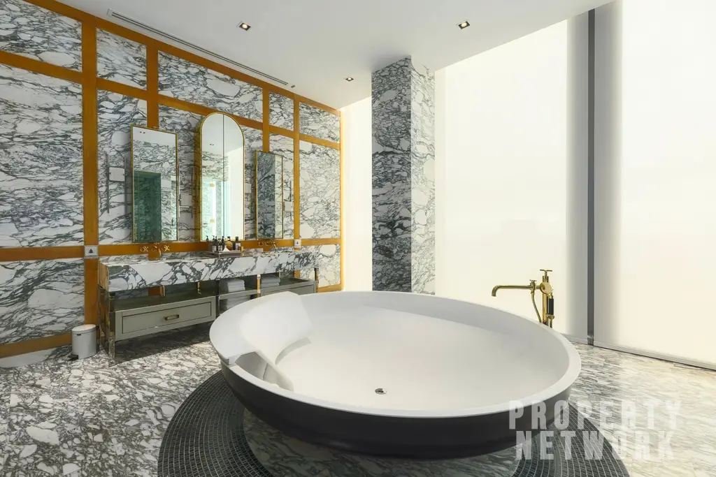 Discover luxury living at The Ritz-Carlton Residences, a 4-bedroom, 4-bathroom condo on the 58th floor, offering 486 sqm of elegance for sale at 350M THB. near BTS Chong Nonsi and near MRT Sam Yan