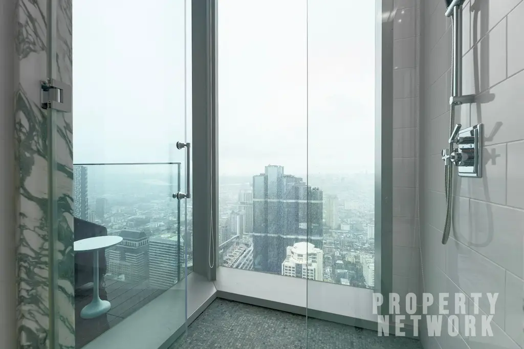 Discover luxury living at The Ritz-Carlton Residences, a 4-bedroom, 4-bathroom condo on the 58th floor, offering 486 sqm of elegance for sale at 350M THB. near BTS Chong Nonsi and near MRT Sam Yan