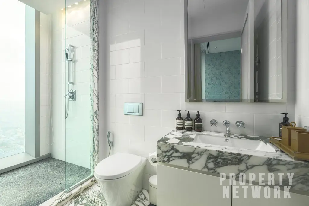Discover luxury living at The Ritz-Carlton Residences, a 4-bedroom, 4-bathroom condo on the 58th floor, offering 486 sqm of elegance for sale at 350M THB. near BTS Chong Nonsi and near MRT Sam Yan