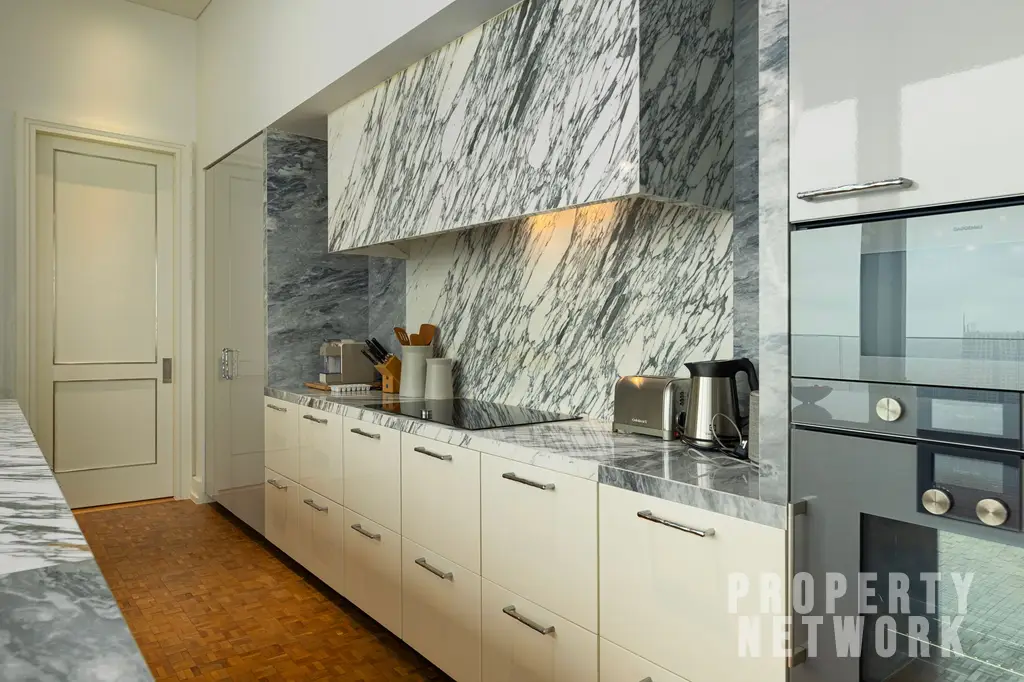 Discover luxury living at The Ritz-Carlton Residences, a 4-bedroom, 4-bathroom condo on the 58th floor, offering 486 sqm of elegance for sale at 350M THB. near BTS Chong Nonsi and near MRT Sam Yan